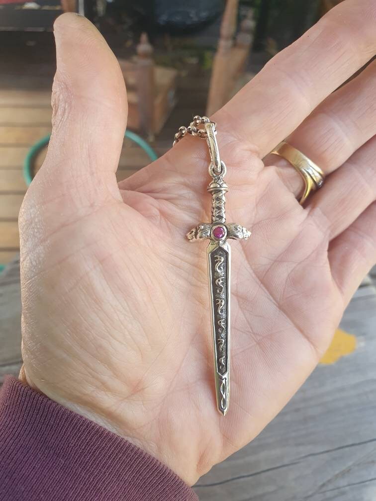 sword pendant,sterling silver pendant,beautifully  detailed with lions heads,medieval long pendant.