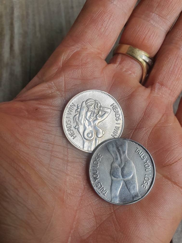 Silver coin,heads and tails coin, sterling silver.flip a coin..