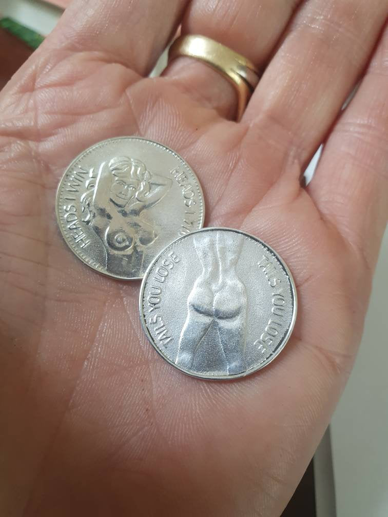 Silver coin,heads and tails coin, sterling silver.flip a coin..