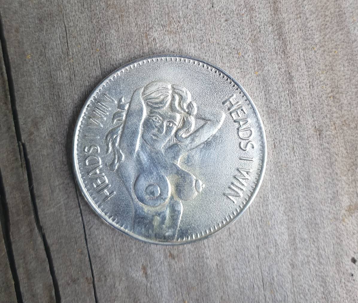 Silver coin,heads and tails coin, sterling silver.flip a coin..